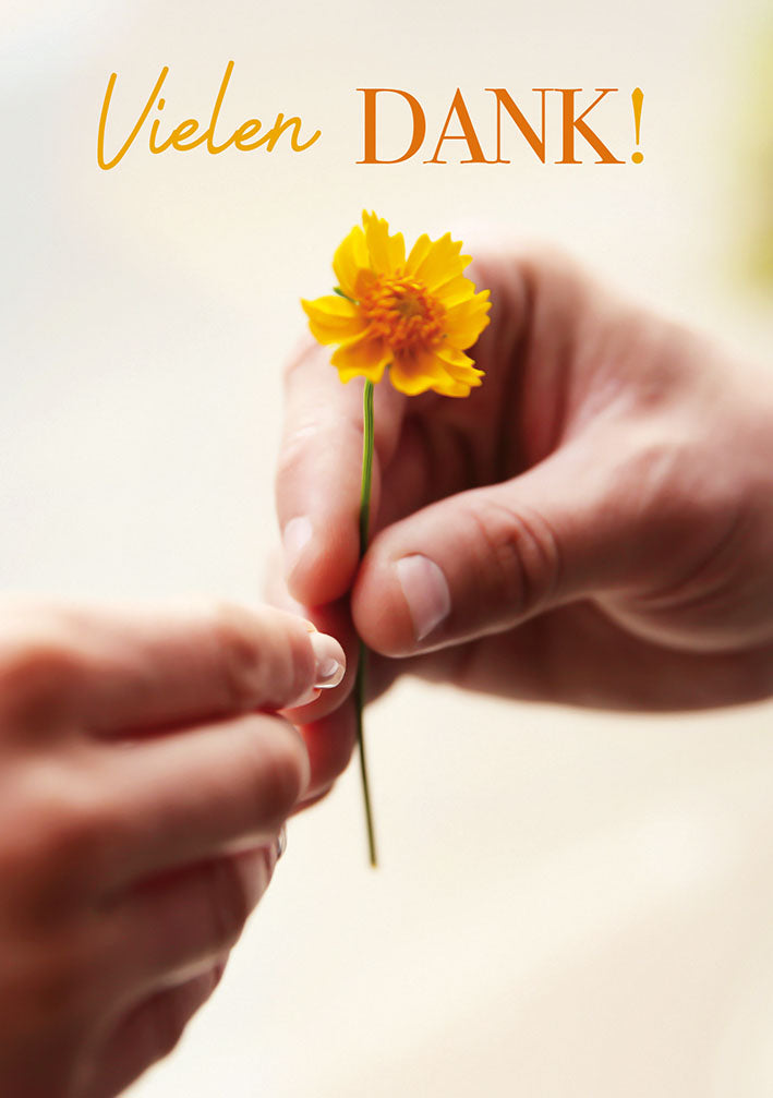 Dankeskarte „Blume in der Hand – Vielen Dank“